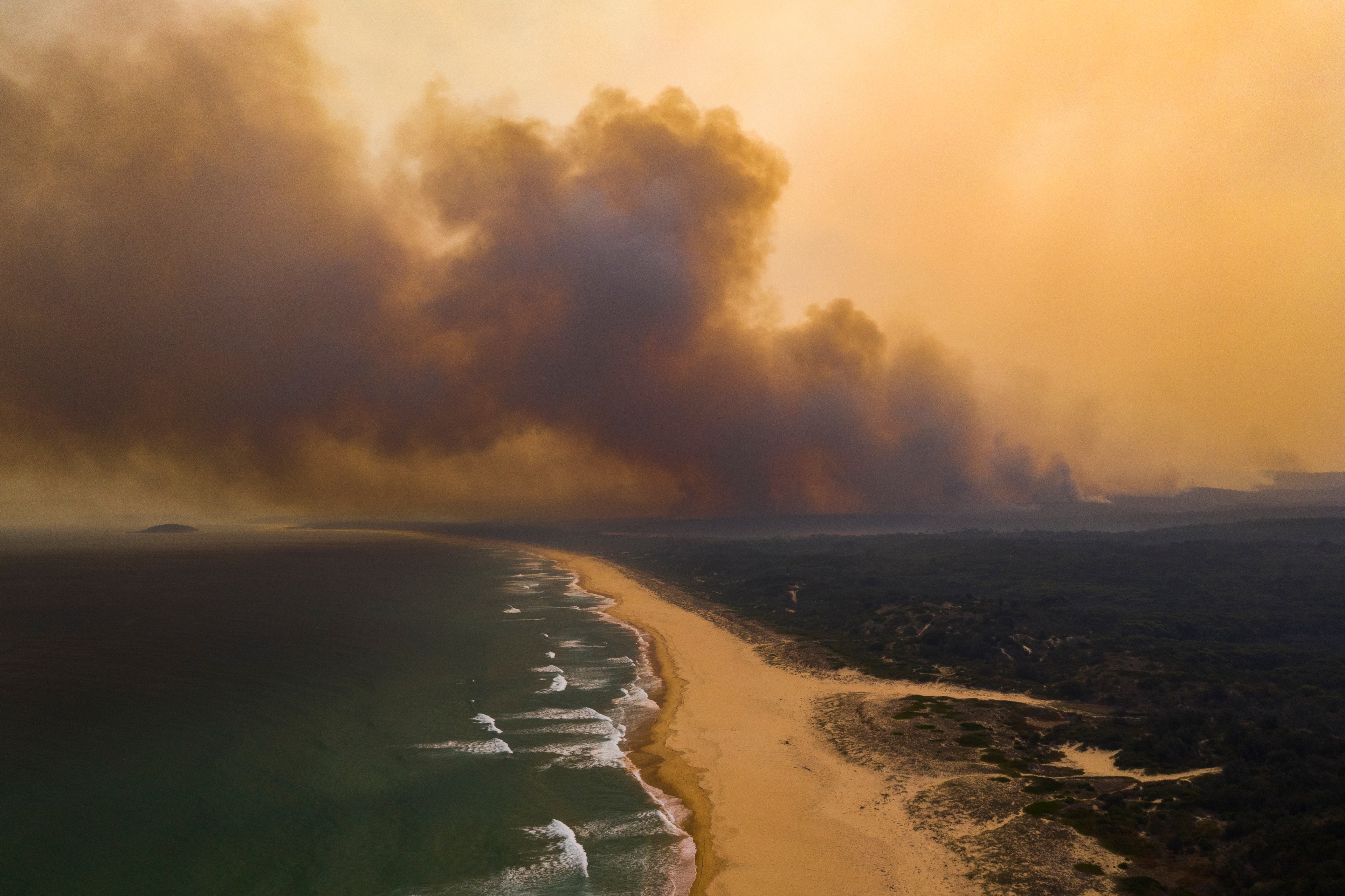 Bushfire smoke over sea