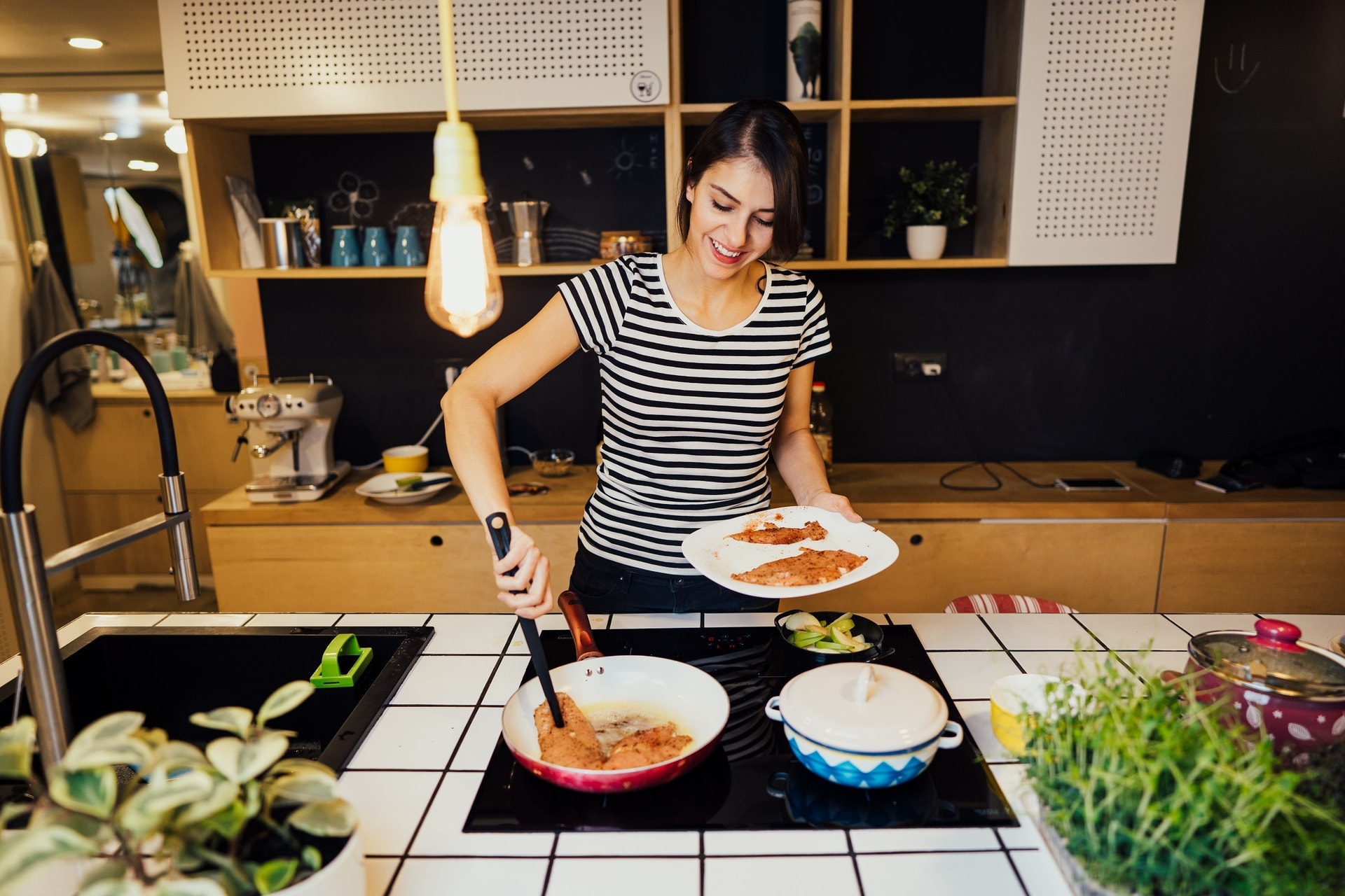 Cooking with induction shutterstock 1278526834