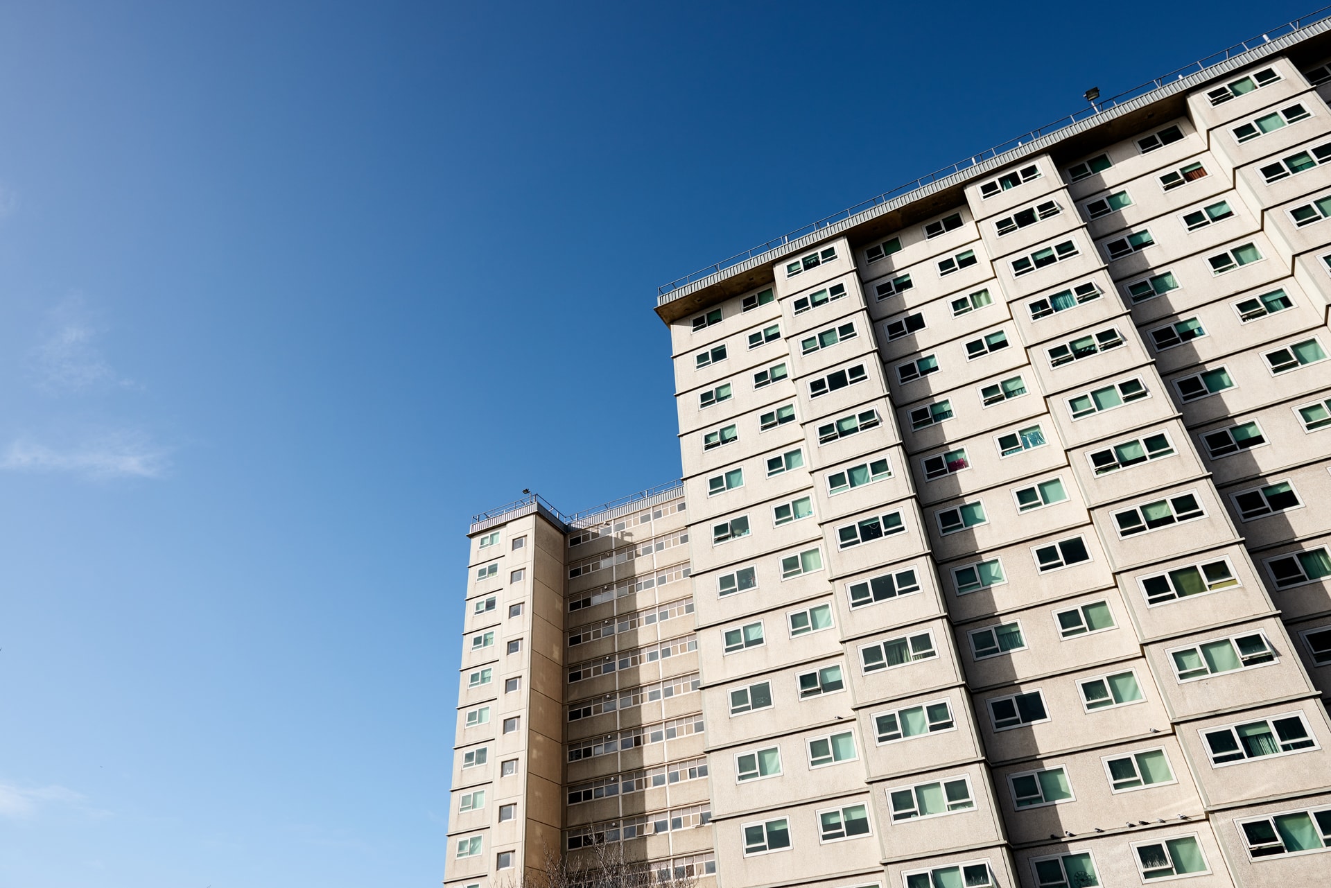 Social housing tower and blue sky